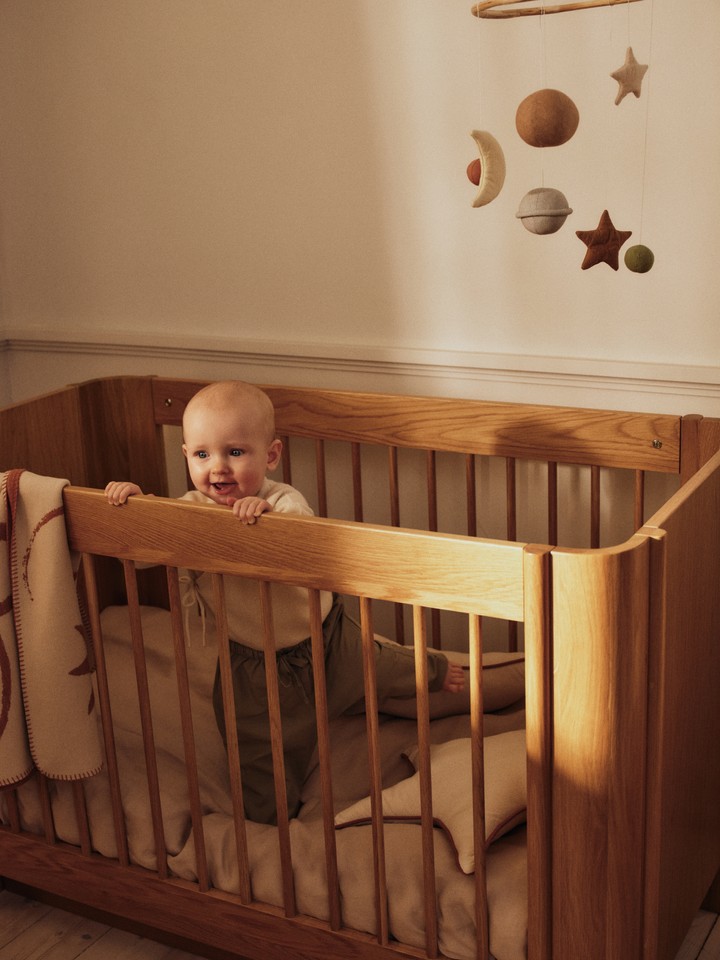 FermLiving_SS26_SkyeMobile_1104273156_TiluBabyCot_1104273074_SkyeBlanket_1104273046_StarCushion_1104273196
