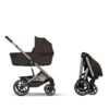 Cybex Balios S Lux i Chocolate Brown slått sammen med Fold Cot montert